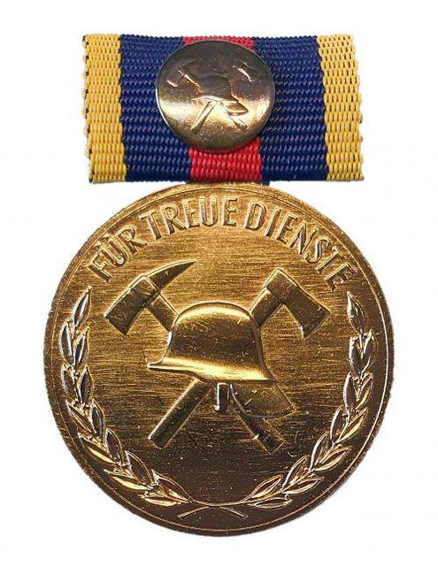 Medal, GDR fire brigade gold with badge - Like new